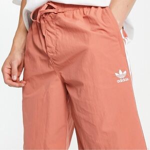 adidas Originals adicolor three stripe 10 inch shorts in beige